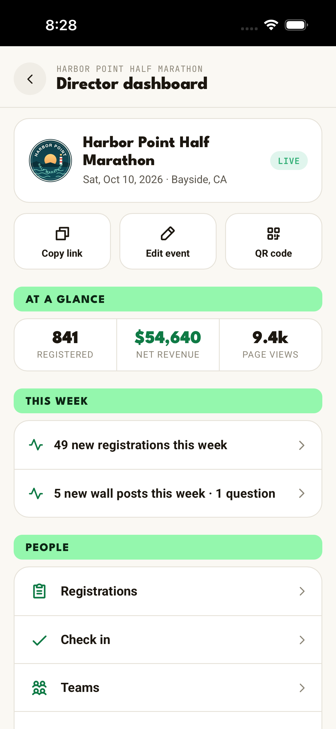 The same race managed from the Run This native app, with an at-a-glance strip of registrations, net revenue, and page views